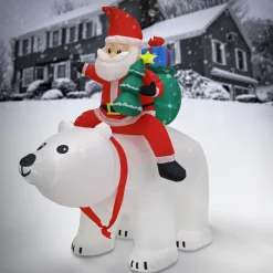 National Tree Company 6 ft. Inflatable Santa Riding Polar Bear