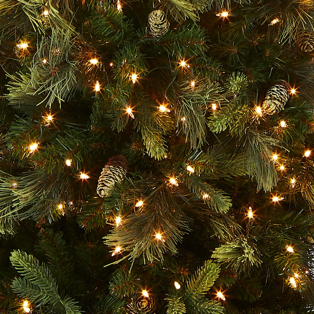 New National Tree Company 9 ft. Pre-Lit Carolina Pine Slim Tree with Clear Lights