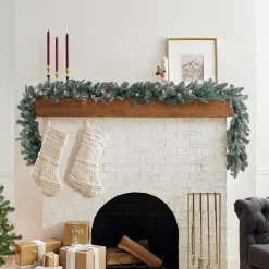 New National Tree Company 9 ft. Pre-Lit Frosted Arctic Spruce Garland with Clear Lights