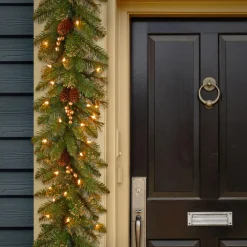 New National Tree Company 9 ft. Pre-Lit Glittery Pine Gold Garland with Clear Lights