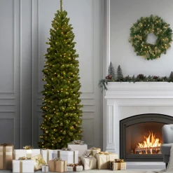 New National Tree Company 9 ft. Pre-Lit North Valley Spruce Pencil Slim Tree with Clear Lights