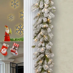 Hot National Tree Company 9 ft. Pre-Lit Snowy Sheffield Spruce Garland with Clear Lights