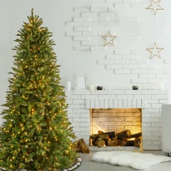 New National Tree Company 6.5 ft. Pre-Lit Tiffany Fir Slim Tree with Clear Lights PE Branch Tips