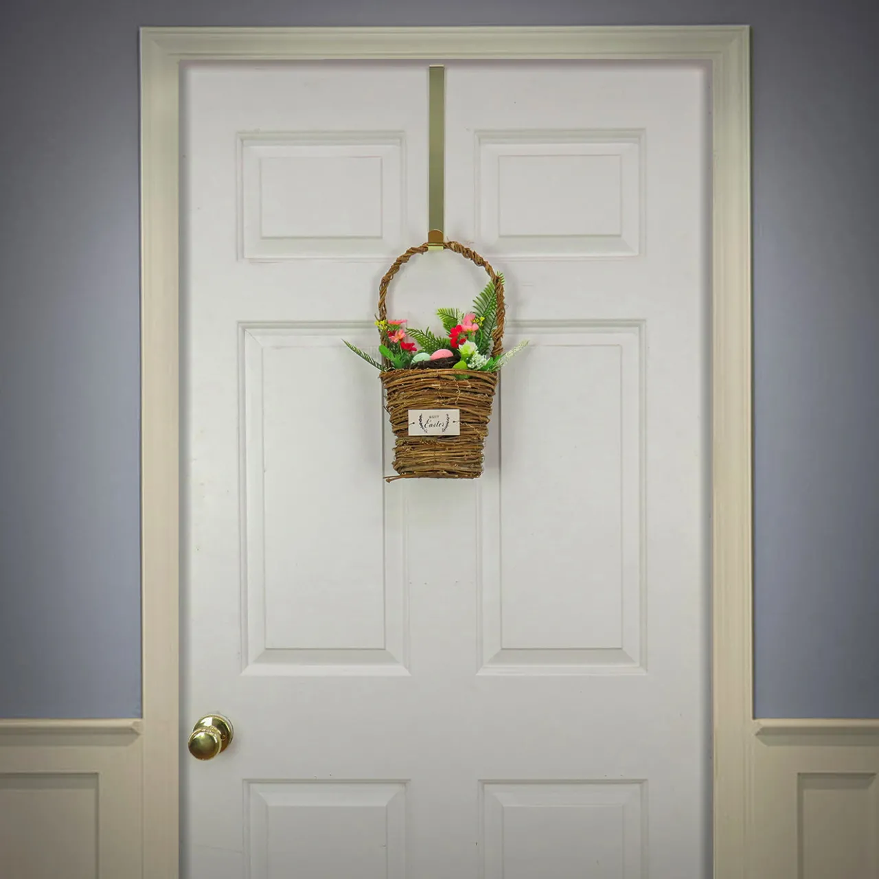 National Tree Company 15 in. Easter Woven Basket Decorated with Colorful Flower Blooms and Leafy Greens
