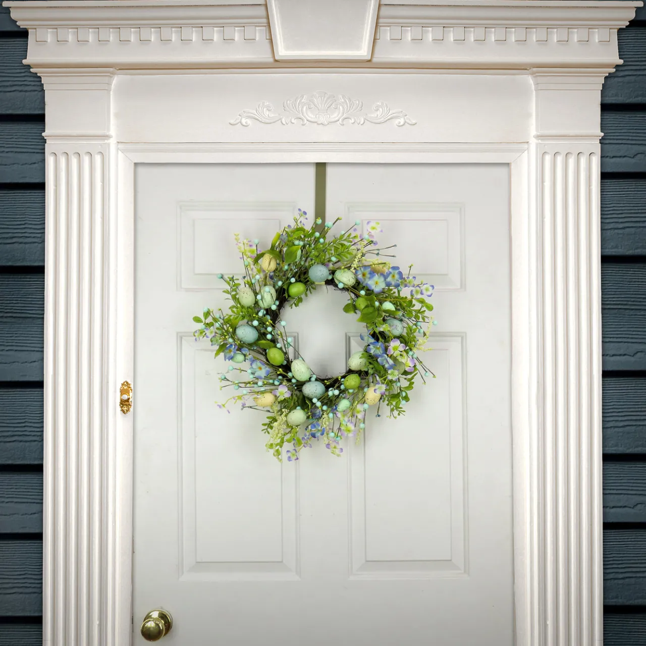 National Tree Company 20 in. Easter Wreath Decorated with Blue Flower Blooms, Pastel Eggs