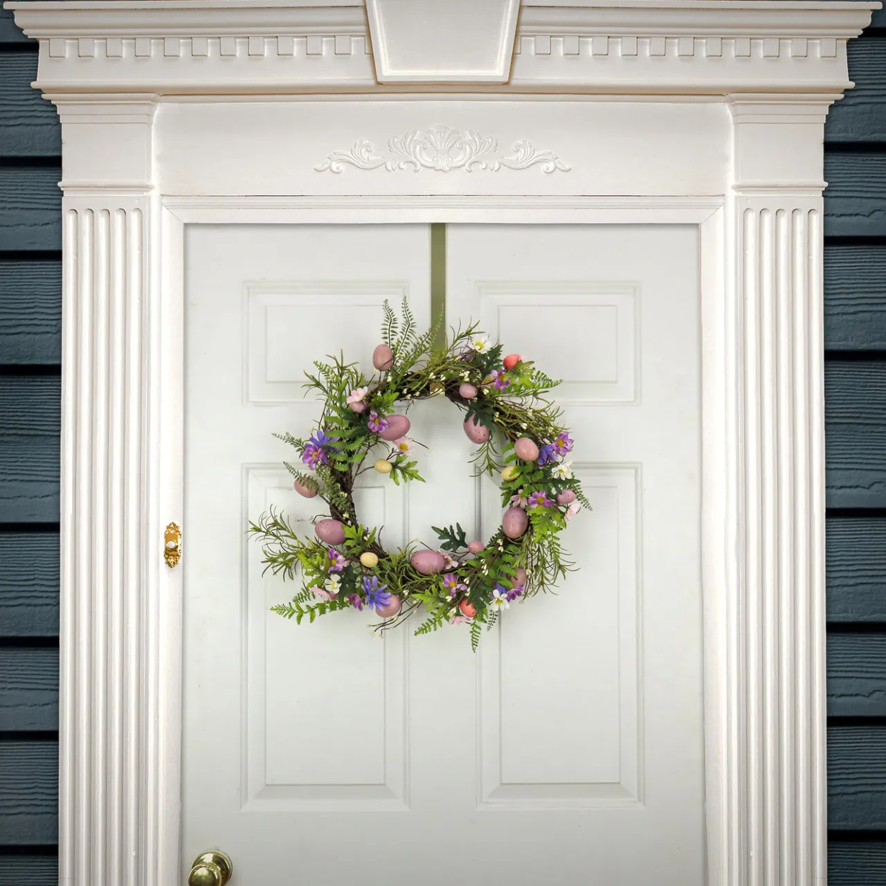 New National Tree Company 22 in. Easter Wreath Decorated with Pink Pastel Eggs, Purple Flowers, Ferns, Leafy Greens