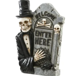 National Tree Company 12 in. Halloween Skeleton Holding a Tombstone Decoration