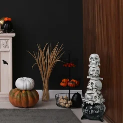 Discount National Tree Company 38 in. Halloween Stacked Skulls in a Cauldron Tabletop Decoration