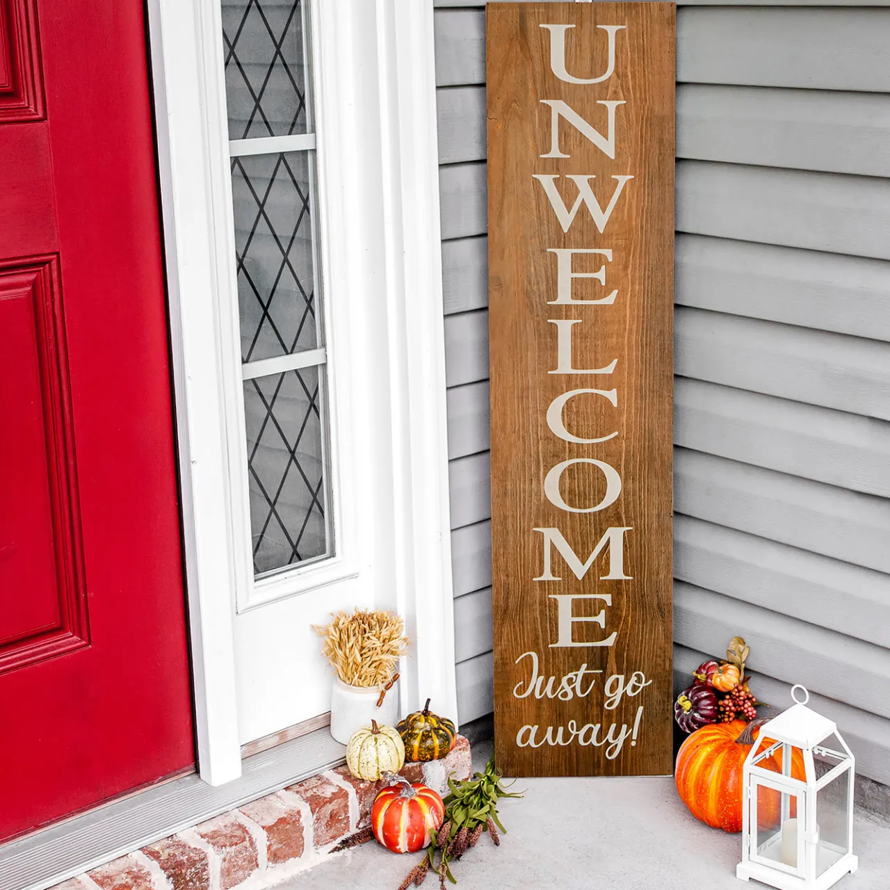 New National Tree Company 39 in. Halloween Unwelcome Just Go Away Wooden Hanging Porch Sign Decoration