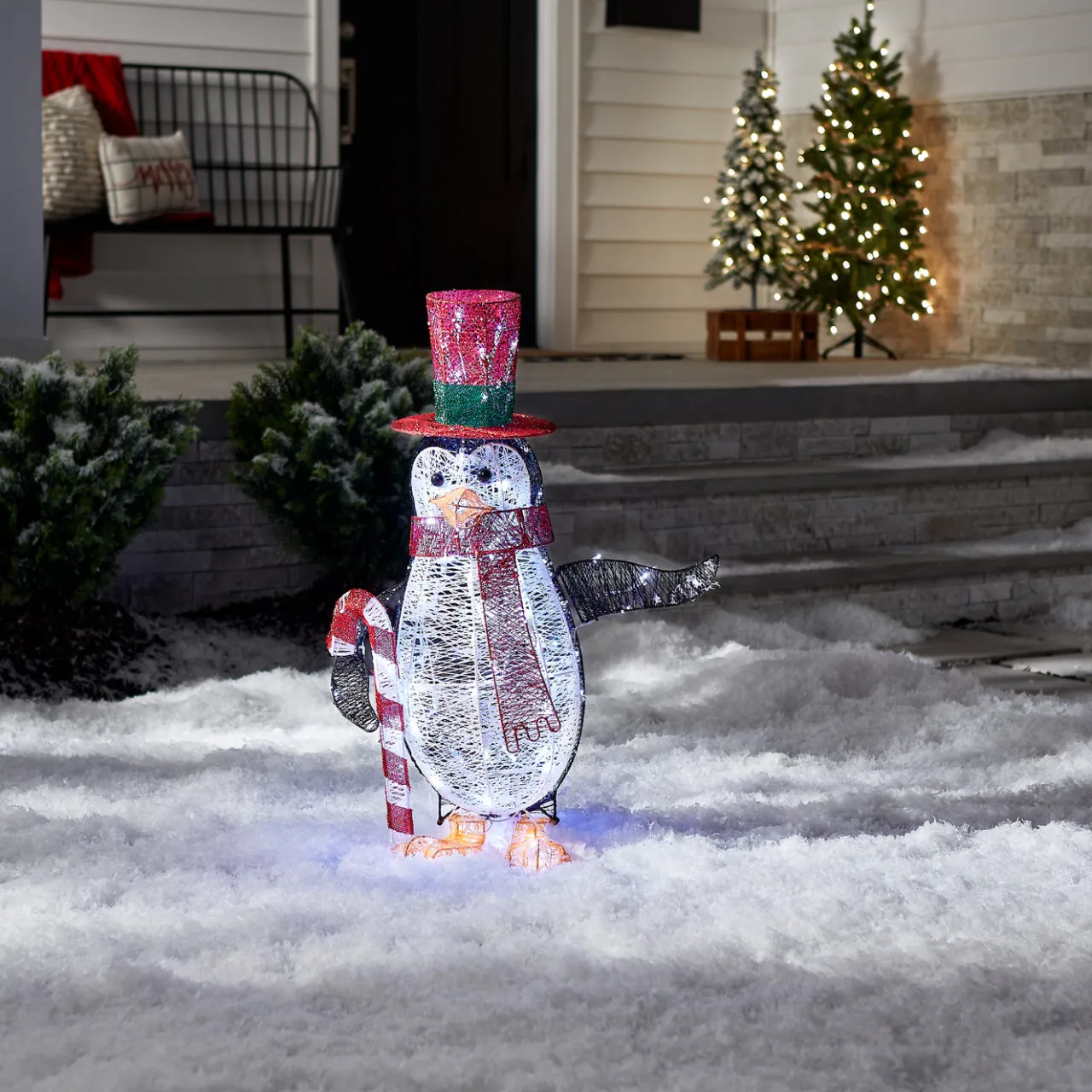 Best National Tree Company 36 in. Pre Lit Penguin with Red Top Hat and Candy Cane Decor