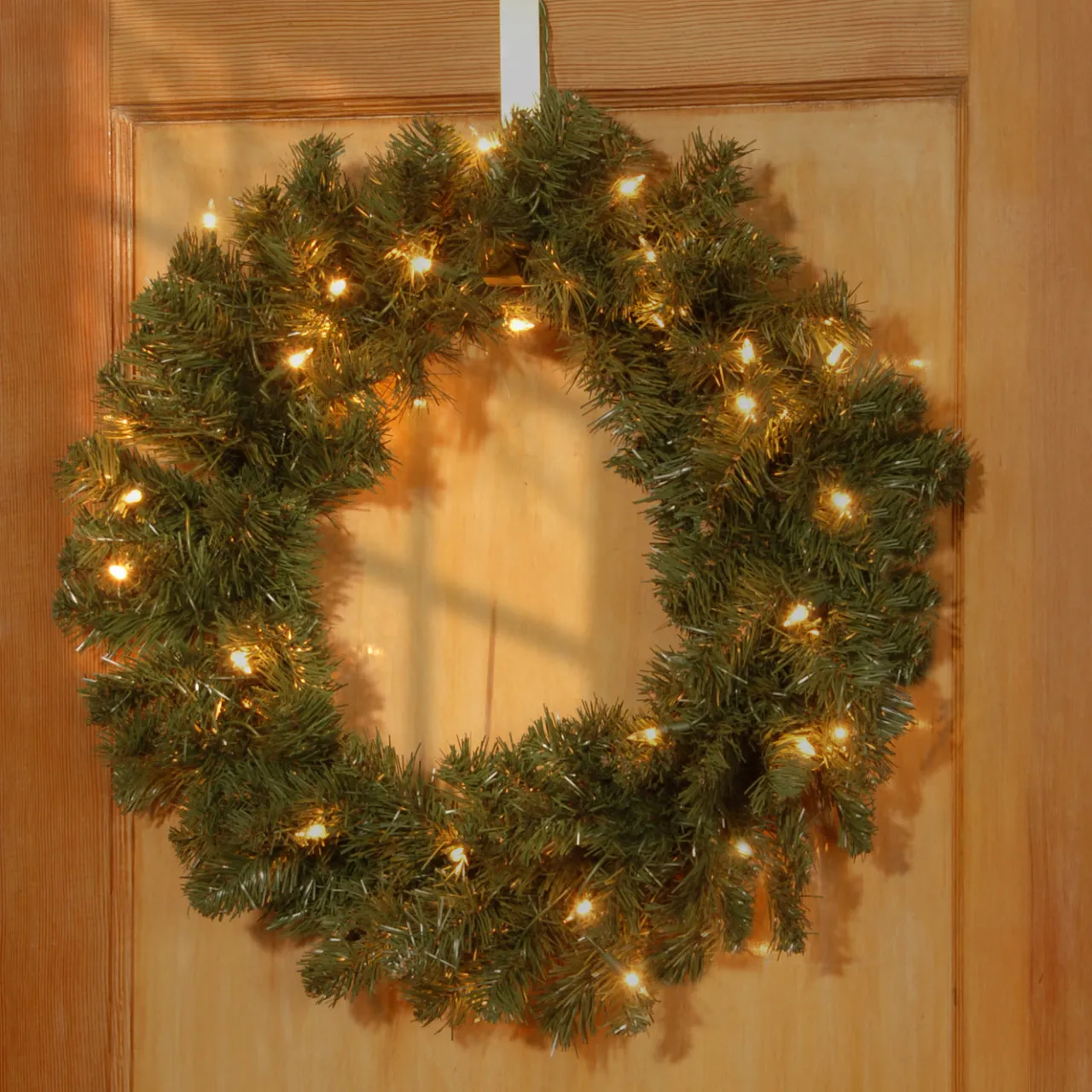 National Tree Company 24 in. Pre-Lit Promotional Fir Wreath with Clear Lights