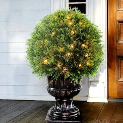 Best National Tree Company 27 in. Pre-Lit Upright Juniper Ball Topiary Tree in a Decorative Urn with Clear Lights