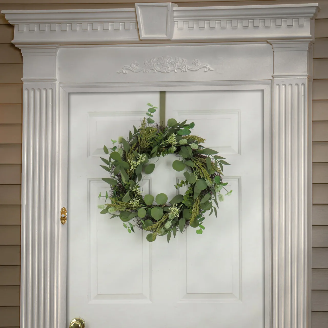 Outlet National Tree Company 22 in. Spring Wreath with Eucalyptus Leaves, Baby's Breath, Flowing Green Stems
